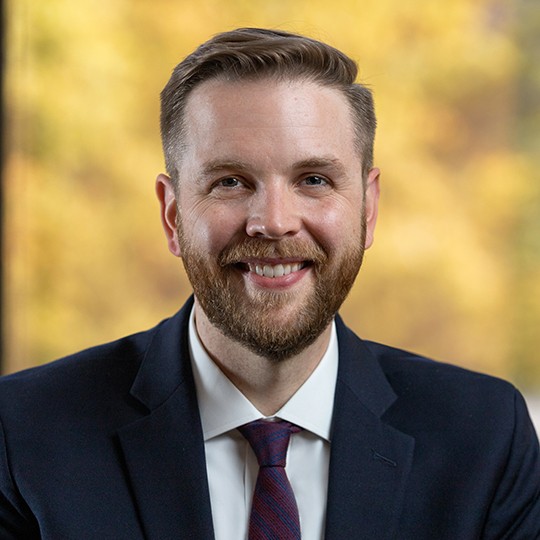 Headshot of Travis Lloyd